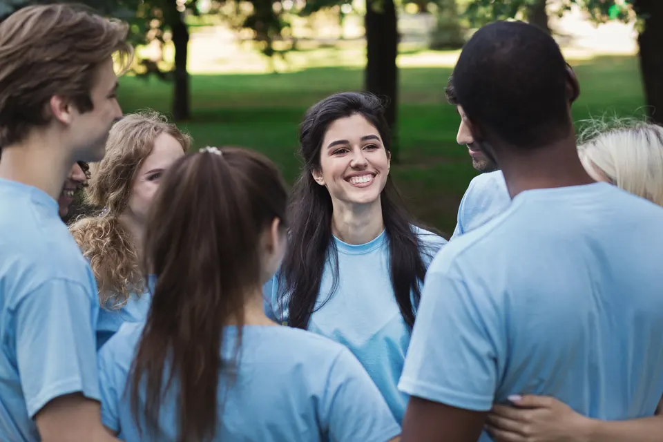 Young adults smiling together outdoors